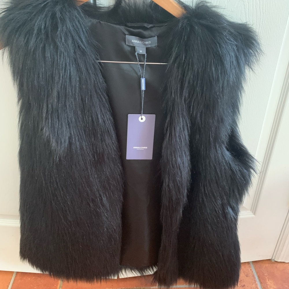 Black faux fur vest